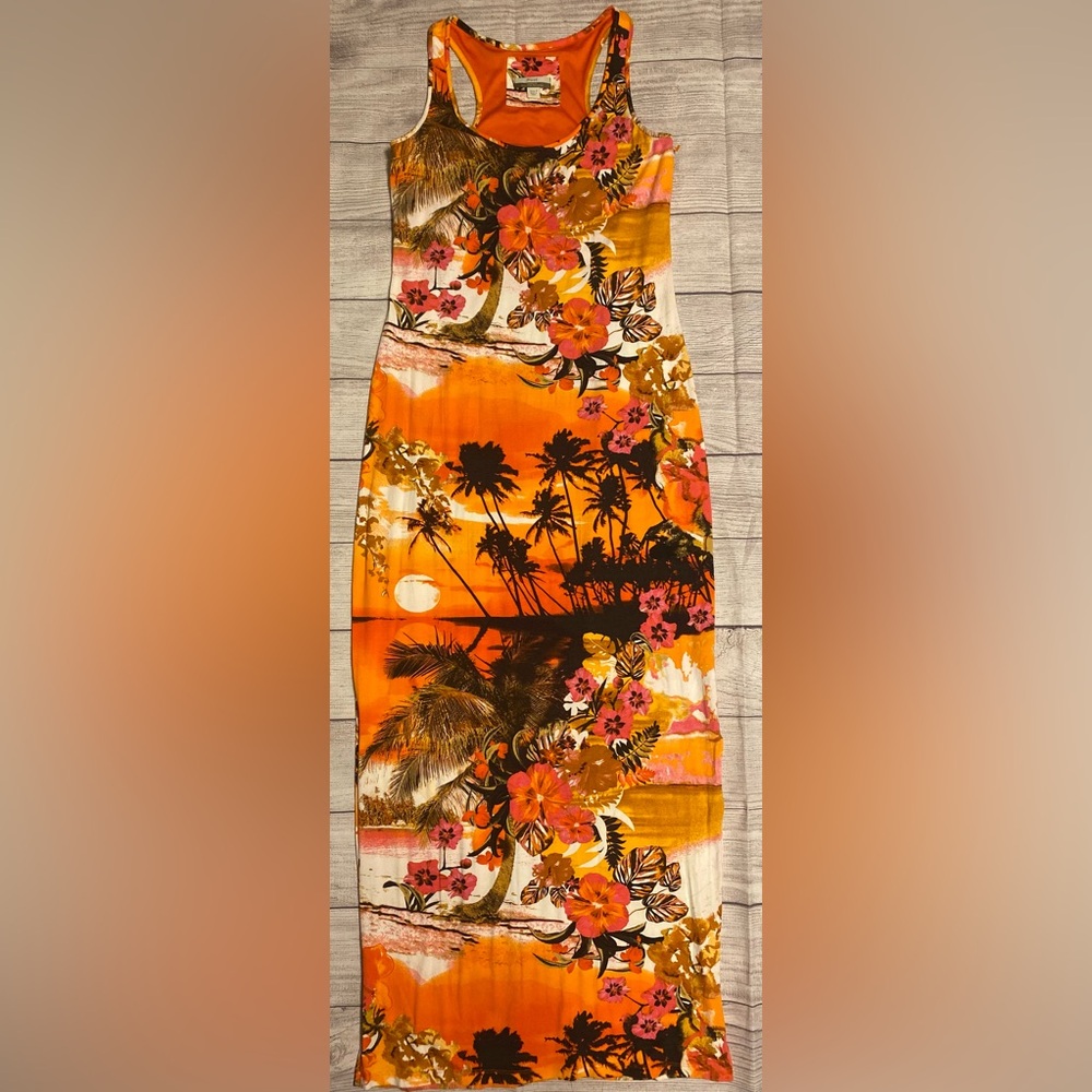 Fairly new. Cute maxi dress with side splits.